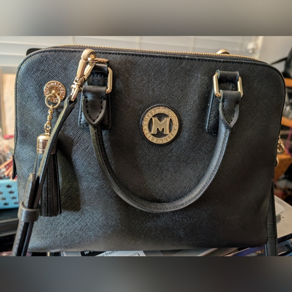 Metro City Crossbody With Fringe Charm And Gold Monogram Hardware It'sExcellent